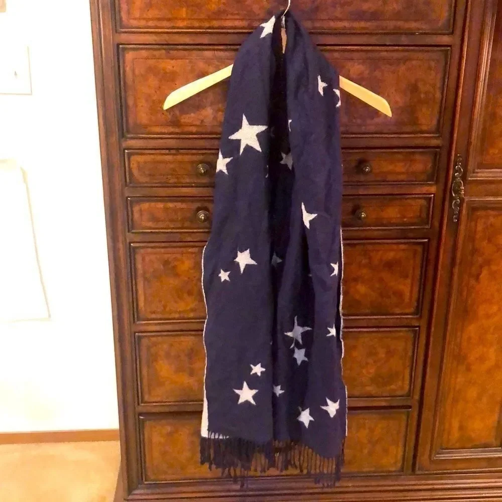 Blue scarf with grey stars on it